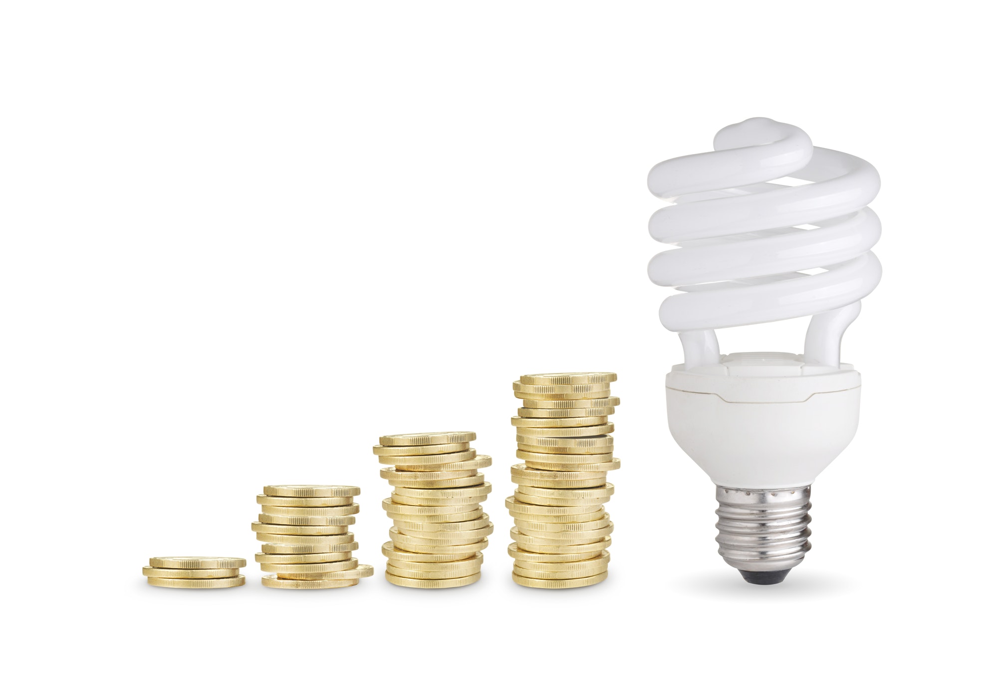 Coins and energy saver bulb